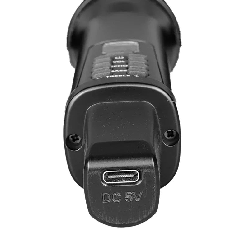 Black car charger with USB port and DC 5V label on a white background